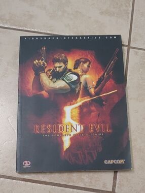 Resident Evil 5 The Complete Official Guide Book Piggyback